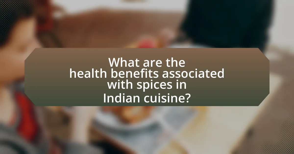 What are the health benefits associated with spices in Indian cuisine?
